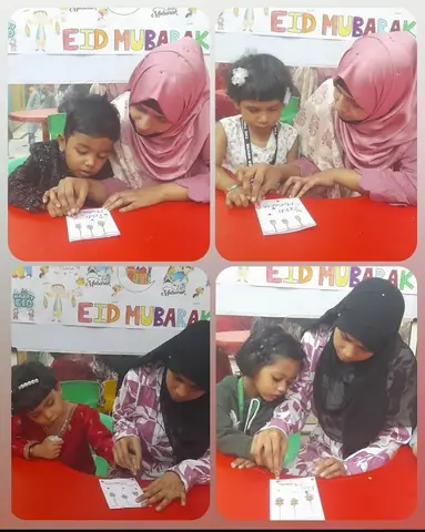 Children making festive cards with teachers
