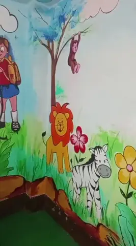 Hand-painted jungle mural with a lion and zebra at The Toddler House